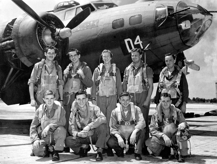 Even though the crew of the B-17 bomber “Straighten Up and Fly Right” was shot down in a raid over Germany they all survived the ordeal. 2nd Lt. Leonard Pogue is standing second from the right.
