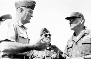 Lt. Col. John Dyer, commander of the Military Air Support Squadron at Cam Ron Bay Air Force Base in South Vietnam (right), talks to Gen. Estes, commander of the Military Air Lift Command (left) while Lt. Gen. Moore, commander of the 7th Air Force in Vietnam (center), listens. The picture was taken in 1966. Photo provided by John Dyer