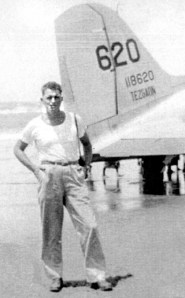 2nd Lt. John Dyer stands near his C-47 transport on a beach along the Bay of Bengal in India during World War II. Photo provided by John Dryer