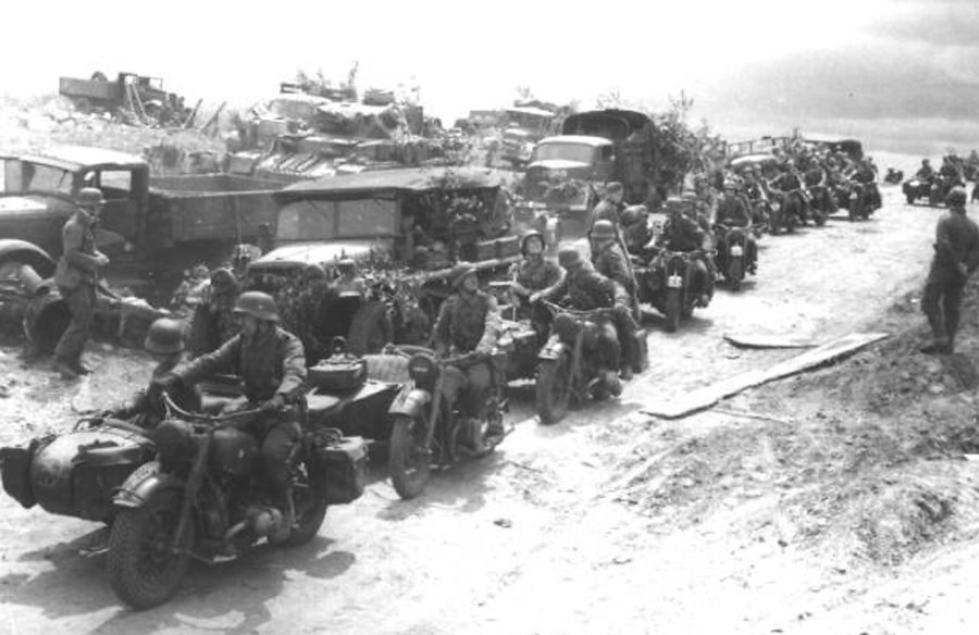 Sgt. Al Mountenay’s Hastings and Prince Edward Regiment from Ontario, Canada made a night raid on the ancient mountain-top fortress at Assaro, Sicily on July 21, 1943. The Canadian unit forced the Herman Goering Regiment, pictured here, to retreat from the stronghold after holding what was thought to be an almost impregnable position for months.