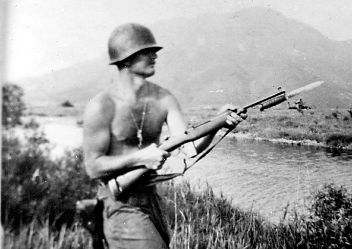 Black is pictured in Korea in 1951 when he was an enlisted man clowning around with his carbine. Photo provided.