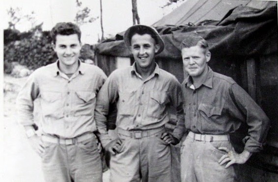 Willard Chamberlin is pictured at the left with a couple of his cooks on Okinawa. Photo provided