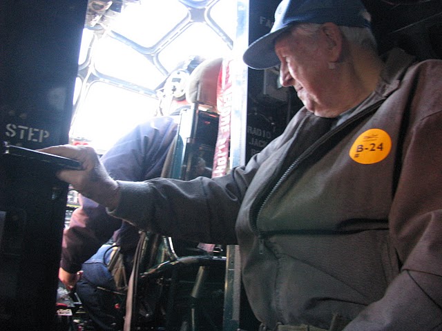 Closely watching Carl eyes the flight crew as they run through the checklist before takeoff in “Witchcraft.” Sun photo by Don Moore