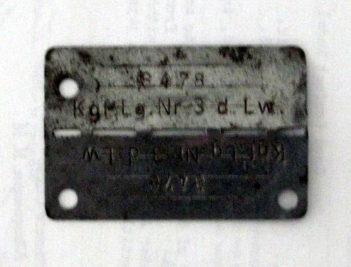 This is the German metal identification tag POW Victor Barber had to keep with him at all times when he was a prisoner in Stalag Luft #3 after his bomber was shot down near Vienna, Austria during World War II. Sun photo by Don Moore