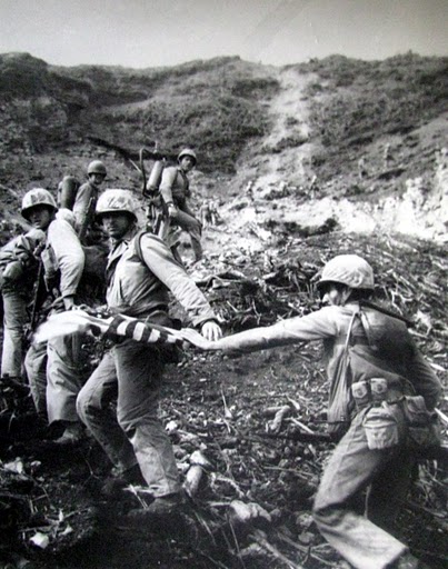 The first flag-raising squad heads up the side of Suribachi at 9:30 a.m. They were part of the 2nd Battalion, 28th Regiment, 5th Marine Division who landed on Iwo Jima. Photo provided by Dick Honyak