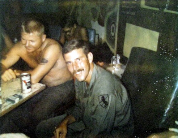 1st Lt. Bill Mc Dermott in the foreground is all smiles because this was his las t day in Vietnam, April 7, 1971. It was the first time in a year he had gotten a cold beer. Photo provided