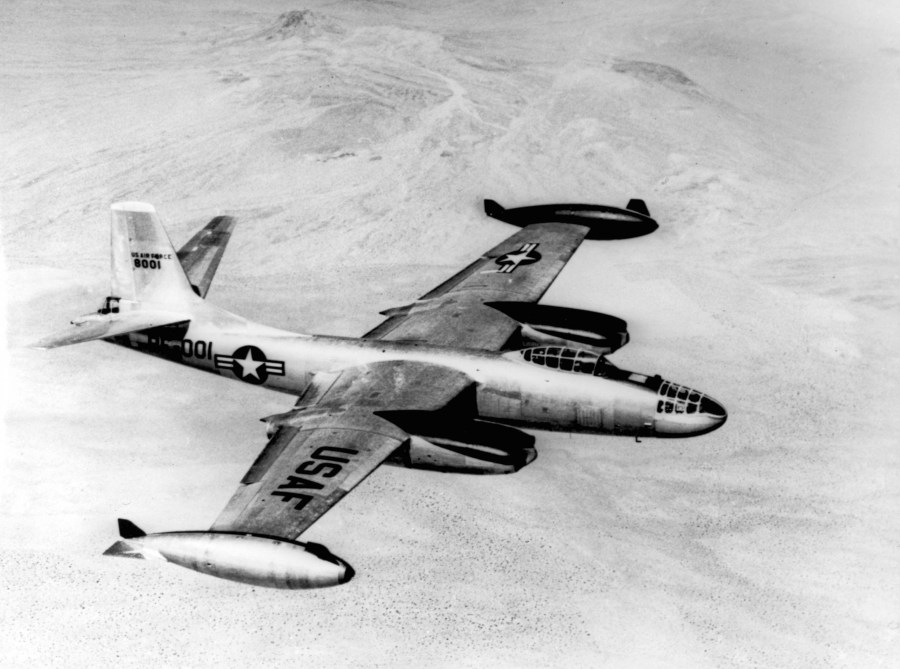 More reach is given to the long striking arm of the U.S. Air Force North American B-45C Tornado four-jet bomber, a "wing tip tank" version of the B-45. The tanks pack much more range into the Tornado's normal tactical radius of over 800 miles. Black paint on inside of tanks and engine nacelles reduce glare. The sleek bombers carry a payload of over 10 tons and are in the 550 miles per hour speed class.