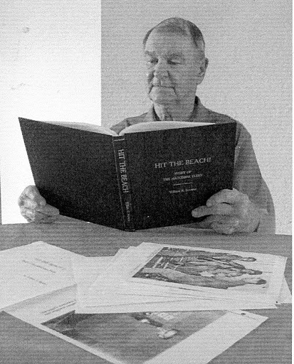 Bill Stevens at "hit the Beach," a book he wrote for his children and grandchildren about his experiences in World War II in the Pacific Theater of Operations. Sun photo by Don Moore