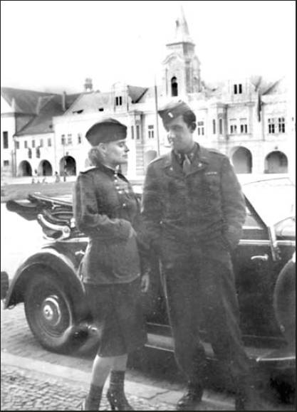 Second Lt. Art Faloris of Rotonda talks to a beautiful Russian army doctor outside a bar in Plzen, Czechoslovakia, near the end of the war in Europe during World War II. Photo provided