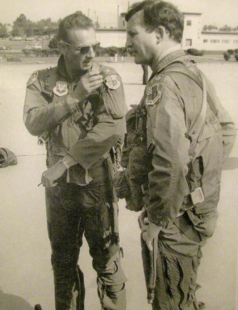 Col. Dick Carr, commander of the 363rd Tactical Fighter Wing (left), talks to Joe Rively, commander of the 19th Fighter Squadron, before both go flying in an F-16 fighter formation at Shaw Air Force Base, SC. Photo provided by Dick Carr