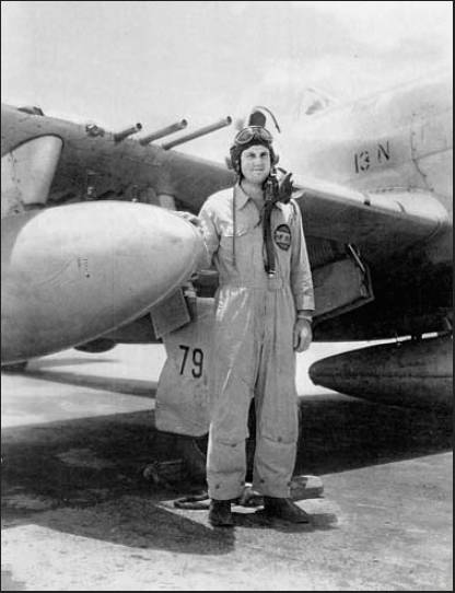 First Lt. Hal Johnson stands in front of his P-47 "Thunderbolt" fighter after World War II when he was flying with the 81st Fighter Group, 91st Squadron, stationed at Wheeler Field in Hawaii. Photo provided