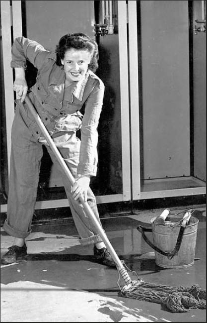 This is Winifred Leiser in an Army publicity shot with a smile on her face as she presumably cleaned up the place for Uncle Sam. 