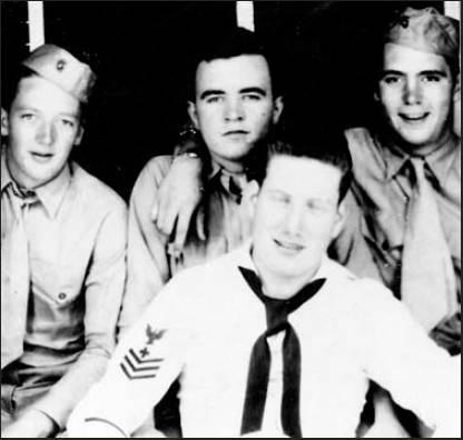 Former Marine Cpl. Walter O'Malley, at the left, is the only surviving member of the group who had their photo taken while in Hawaii during World War II. In the foreground is the company corpsman whose name he can no longer recall. Beside him is Tom Coughlin and Milo Urdeich, two Marine buddies who survived the war. Photo provided