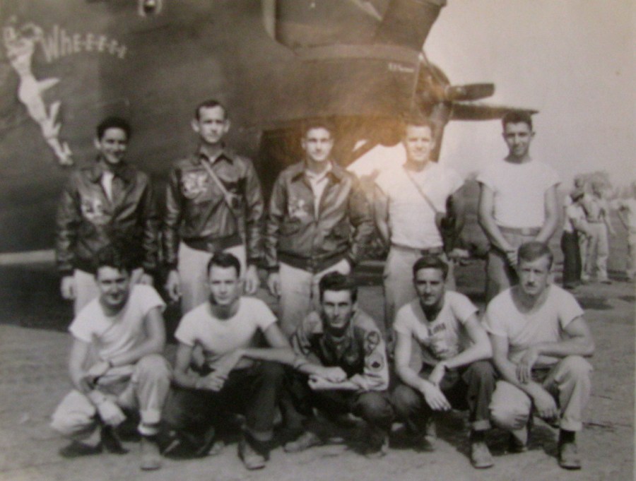 This is the 10-man crew of "Passionate Witch," a B-24, part of the 13th Air Force, 50th Bomb Group, 23rd Bomb Squadron. Driver is the sergeant at the far left squatting. Photo provided