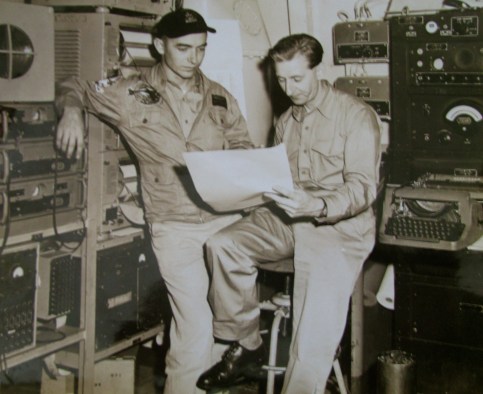 Thomas, on the left, is talking to a British Navy meteorologist aboard the carrier USS Shangri-La during a NATO exercise in the North Atlantic. The two officers got the shock of their lives when they gave Adm. Thomas Moorer a weather briefing aboard his flagship. Photo provided
