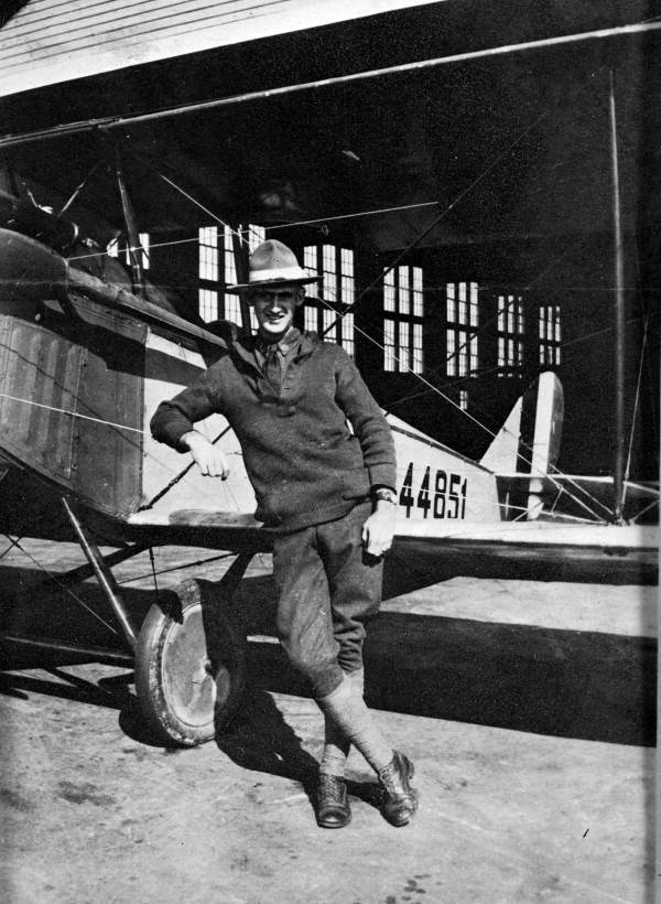 A jaunty un-named World War I aviator leans against his Jennie bi-plane at Carlstrom Field, Arcadia, Fla. in 1918. Photo provided