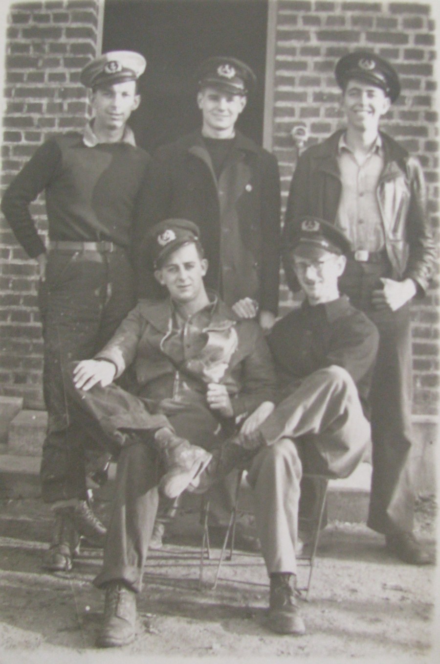 Members of the crew of Y-Boat-71 relax in Le Havre, France during World War II. Harold Power is the one standing in the middle, back row. Photo provided