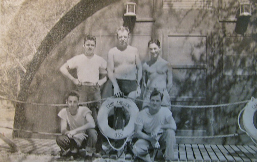  Shiro and several members of the Independence's crew are having a ball in Honolulu during a three day liberty. He is the guy squatting at the front right. Photo provided 