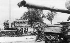  U.S. Marines advance past an M48 Patton tank during the battle for Huế. Photo provided 