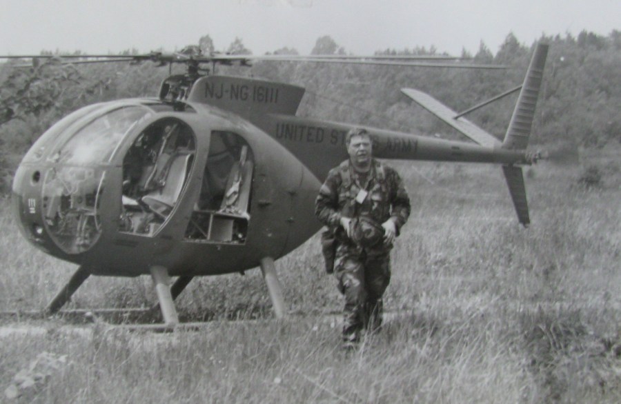 Dickinson leaves his OH-6 "Little Bird" helicopter during a training exercise at Fort Drum, N.Y. Photo provided