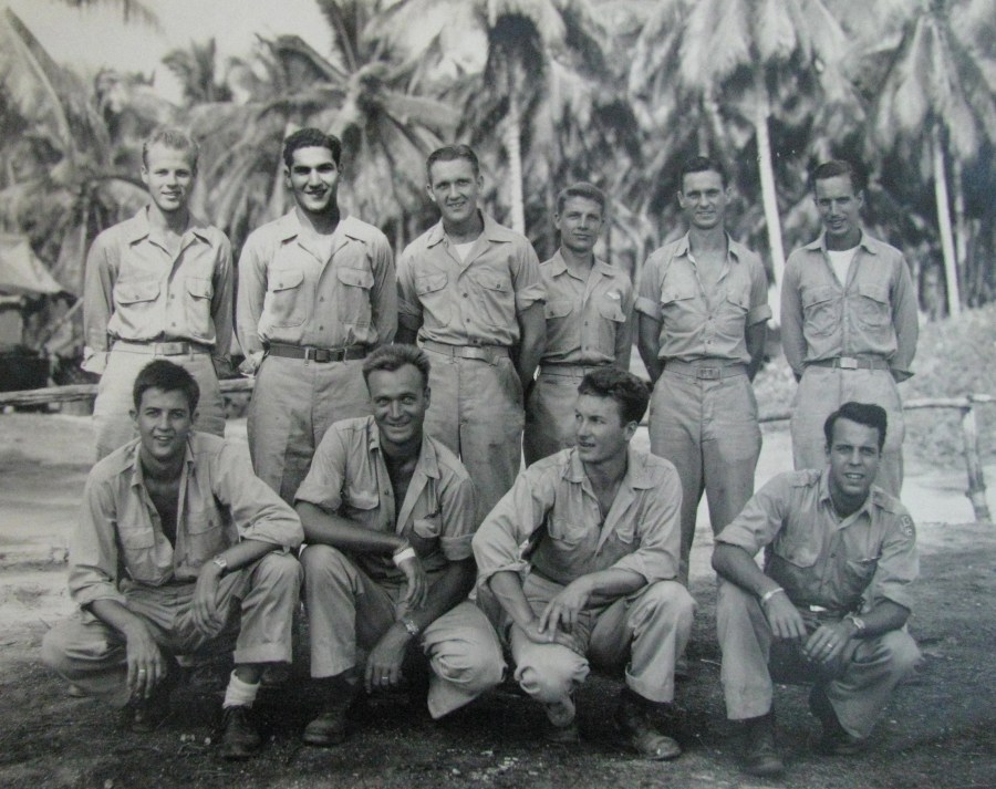  This was Greenwood's bomber crew. He is the fellow at the far left squatting. Next to him is George Price, pilot of the four-engine bomber who Greenwood said was the best B-24 pilot in the Air Corps. The picture was taken on Morotai Island in the Pacific in 1945 Photo provided