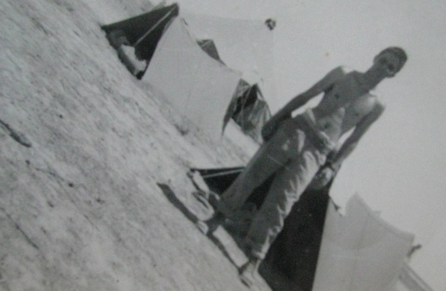 Twenty-year-old Vern Greenwood stands in front of a pup tent during maneuvers in the New Mexico desert in 1943. This was before he became a bombardier on a B-24 "Liberator" bomber in the 13th Air Force in the Pacific during World War II. Photo provided 
