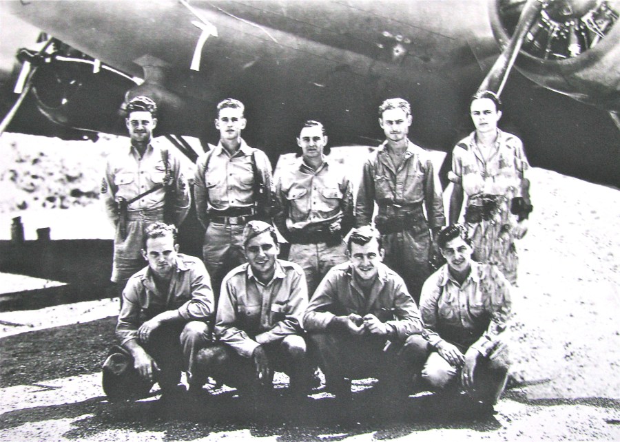 This is Pickering's B-17 crew when he was flying out of Port Moresby, New Guinea with the 64th Squadron, 43rd Bomb Group, 5th Air Force in World War II. He was the co-pilot and the fellow in the front row with the hat on. Photo provided by John Pickering