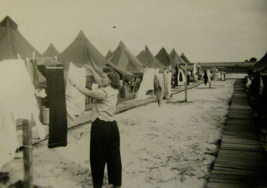  Putting out the wash in Mature, Tunisia, Jean and her fellow nurses lived in the eight-person tents in the background. Photo provided