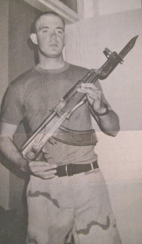 Nethery holds a Russian-designed AK-47 assault rifle. This is the type of rifle with which many of the insurgents are armed in Iraq. Because of its dependibility and fire power, it's one of the most popular rifles ever made. Photo provided