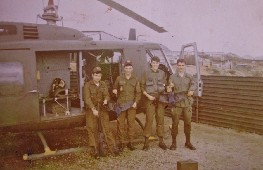 This was Stivers' Huey helicopter crew in Vietnam. He's the guy second from the left who piloted the aircraft. Photo provided