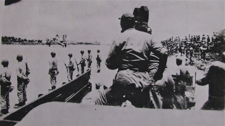 Lt. Gen. Torasirou Kawabe, head of the Japanese surrender delegation walks across to the waiting American C-54 transport where he signed the preliminary surrender document and flew on to meet Gen. Douglas MacArthur in Manila. Photo provided by Giff Stowell