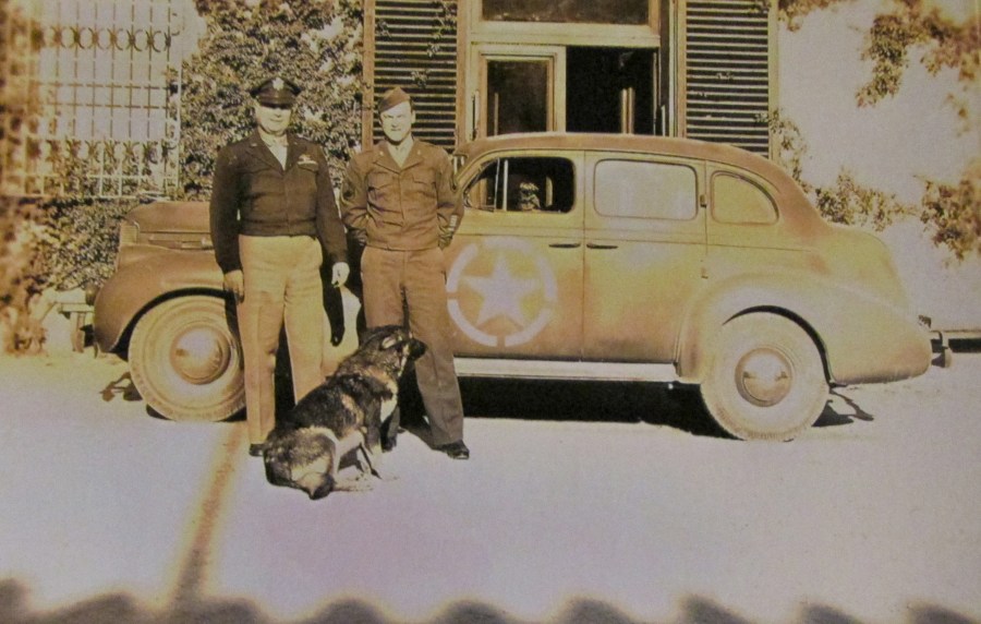 Brigadier General and his chaueffeur are pictured outside their Italian villa with the general's personal car. Photo provided