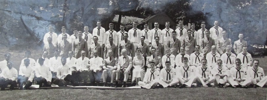 President Dwight Eisenhower (seated front row center) and his White House staff. Goff is pictured in the second row behind the president fifth from the left. Photo provided