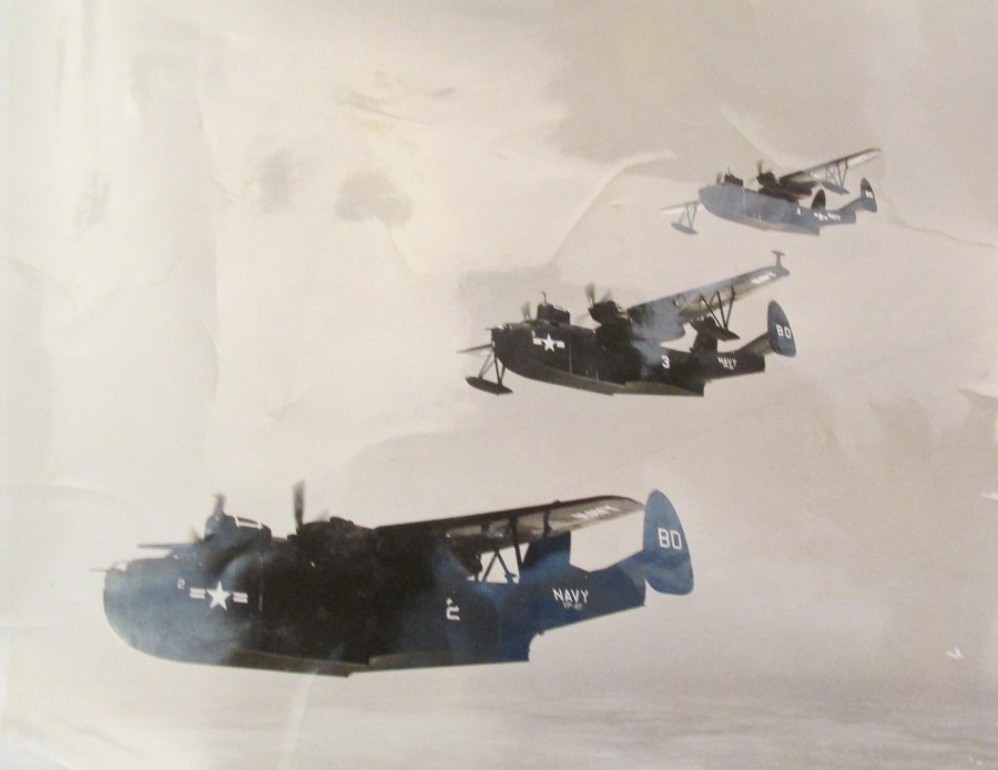 Like ducks in a row a trio of PBM "Martin Mariners" fly over Manila in the Philippines during the Korean War of the 1950s. Dale Davis is at the controls of the last plane. Photo provided 
