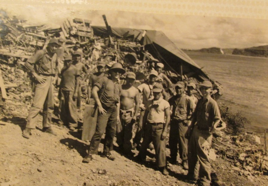  A Japanese POW work detail waits for orders along the side of a road on Saipan. The Seabees used them as construction workers. Photo provided 