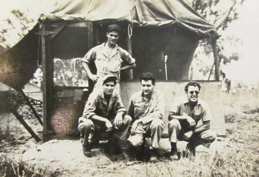 This was Spatharos communications crew when he served in the 89th Bomb Squadron in the Pacific during the Second World War. He's the guy squatting at the far left. Photo provided 
