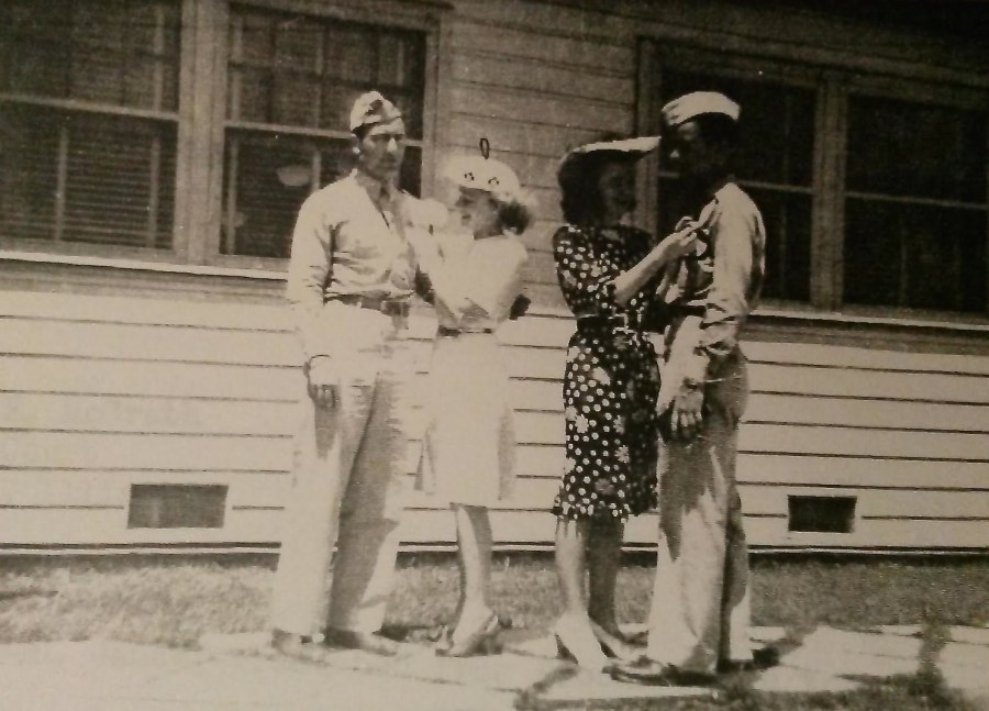 McGrath's wife (L), Betty pins his silver pilot wings at Brooks Field, Tx. Marian Ramstack does the same for her husband, Dick. Photo provided