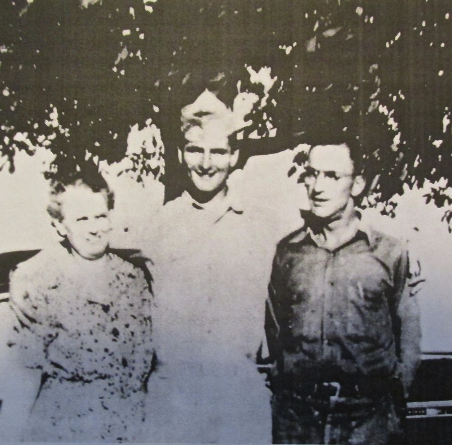 Meadows is shown with his mother and father, Maude and Jesse Meadows, in 1943, just before shipping out overseas at age 19. This picture was taken at his father's Gulf service station in Flint, Mich. Photo provided