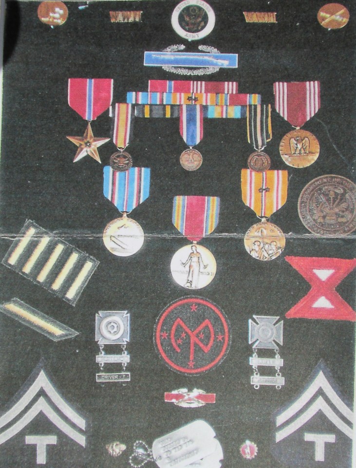  Former Sgt. Bobbie Caho has a shadowbox full of medals he received during his time with the 27th Infantry Division in the Pacific in World War II. To go with his Tech Sergeant stripes he received the Combat Infantryman's Bade, Bronze Star with "V" for valor and World War II Victory Medal among others. Photo provided