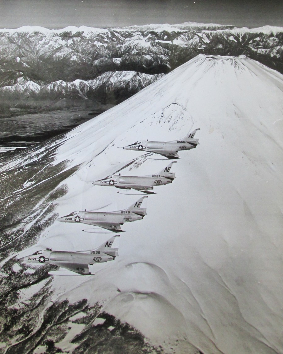 A flight of A-4 "Skyhawk" jet bombers fly past Mount Fuji in Japan to produce the cover on "All Hands" Navy magazine in the 1960s. Jim William's jet is the one at the bottom flown by Cmdr. Rush Smith, commander of Squadron VA-22. Photo provided
