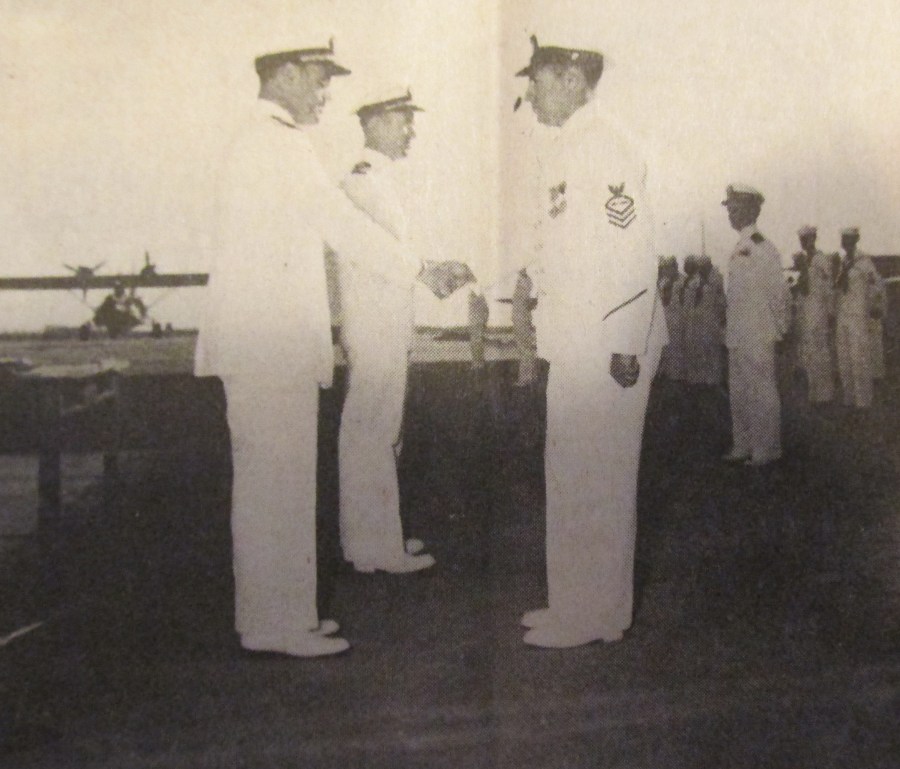 Chief Arcidiacomo, right, is presented two Distinguished Flying Crosses. Photo provided