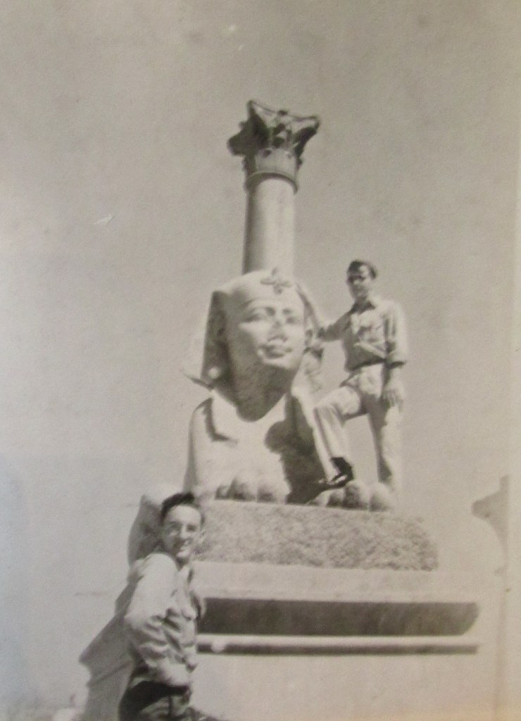Glenn stands next to a Sphinx and Pompey's Pillar during his trip to  Egypt right after the Second World War. Photo provided 