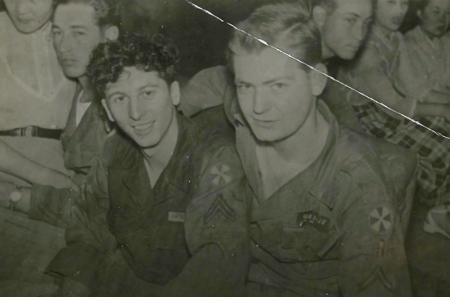 Robert Borboro, left, sits with a buddy sometime during his two-year tour in Korea during the Korean War. 