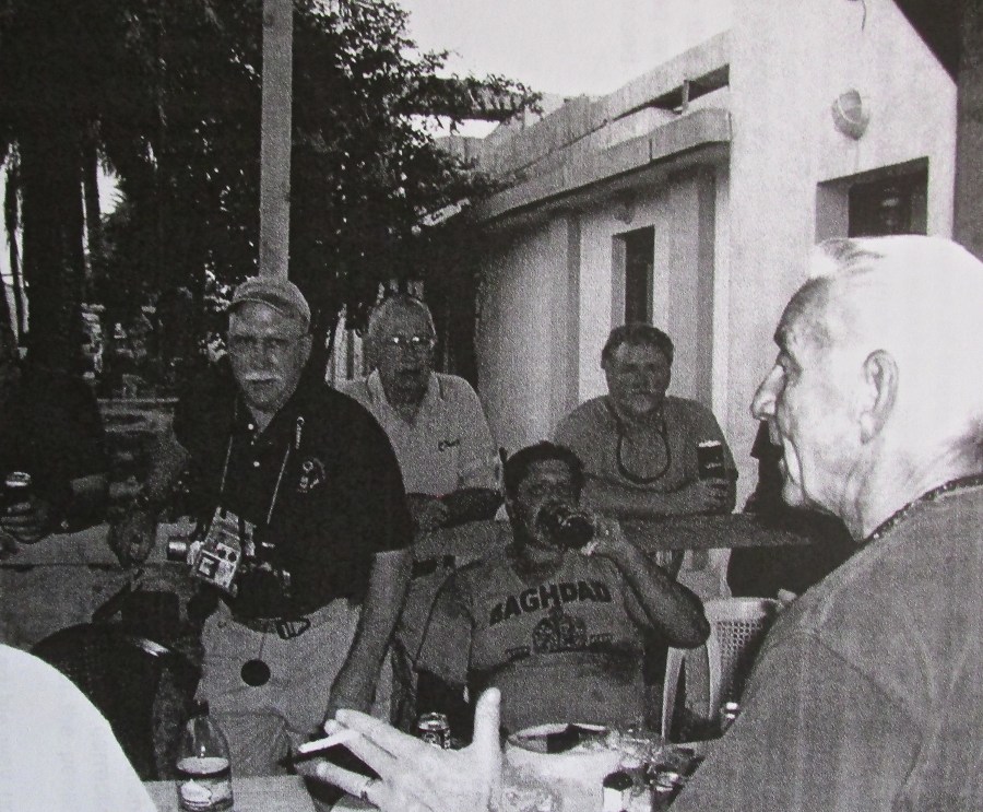 Don Bordenkircher, right foreground, talks to some of his staff in Iraq where he served in 2006 as National Director of All Prisons in Iraq. Photo provided