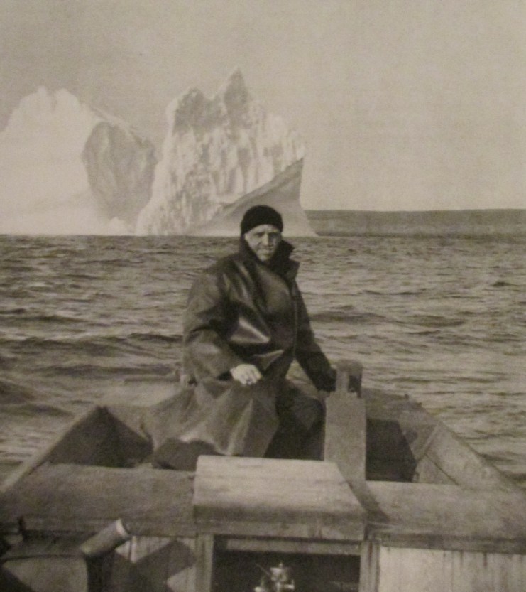 Musician 2nd Class Hap Saams is pictured in the stern of a local fishing boat with icebergs in the background off Argentia, Newfoundland during World War II when he was serving in the U.S. Navy. Photo provided