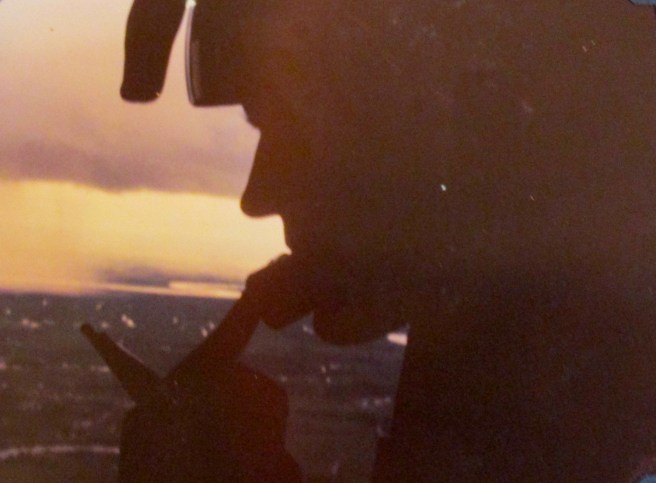This is Block in silhouette flying in a Huey helicopter above the battle field in Vietnam. He was operation officer for the 199th Infantry Battalion in 1968 at the time. Photo provided