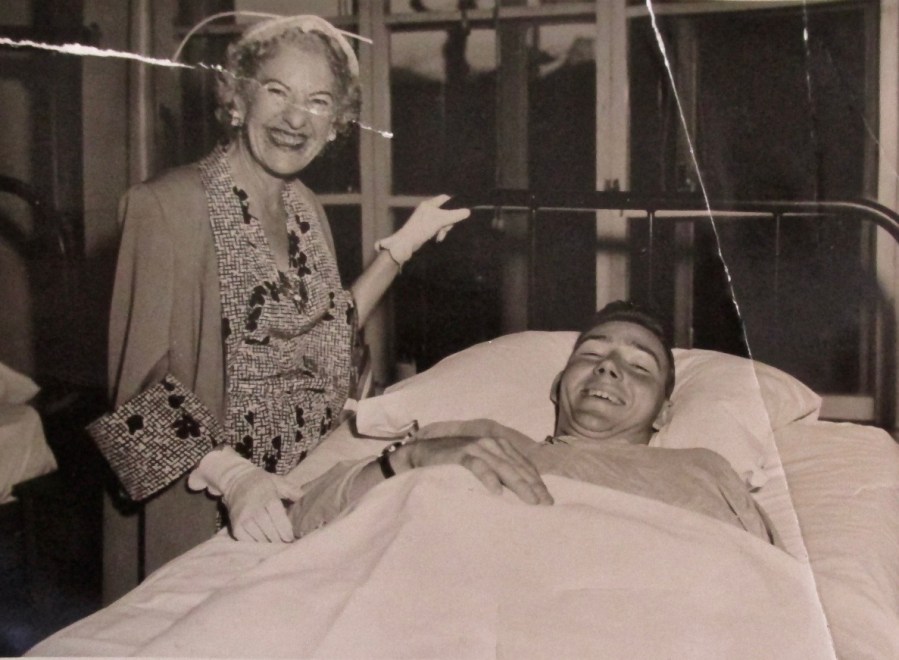 Mrs. Maurine Clark, wife of Gen. Mark Clark, visits Ed Garrick of Port Charlotte while he recoups from war wounds in Tokyo in 1953 following the battle of Pork Chop Hill in Korea earlier that same year. Photo provided